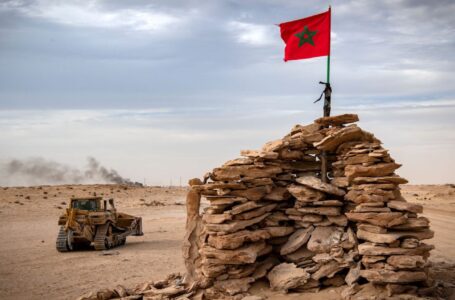 A bulldozer passes by a hilltop manned by Moroccan soldiers on a road between Morocco and Mauritania in Guerguerat located in the Western Sahara, on November 23, 2020, after the intervention of the royal Moroccan armed forces in the area. – Morocco in early November accused the Polisario Front of blocking the key highway for trade with the rest of Africa, and launched a military operation to reopen it. (Photo by Fadel SENNA / AFP) (Photo by FADEL SENNA/AFP via Getty Images)